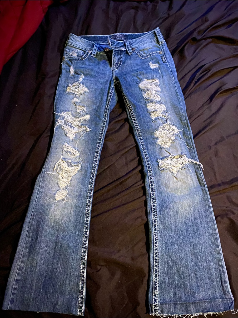 Silver Jeans Distressed Blue Flare Jeans
